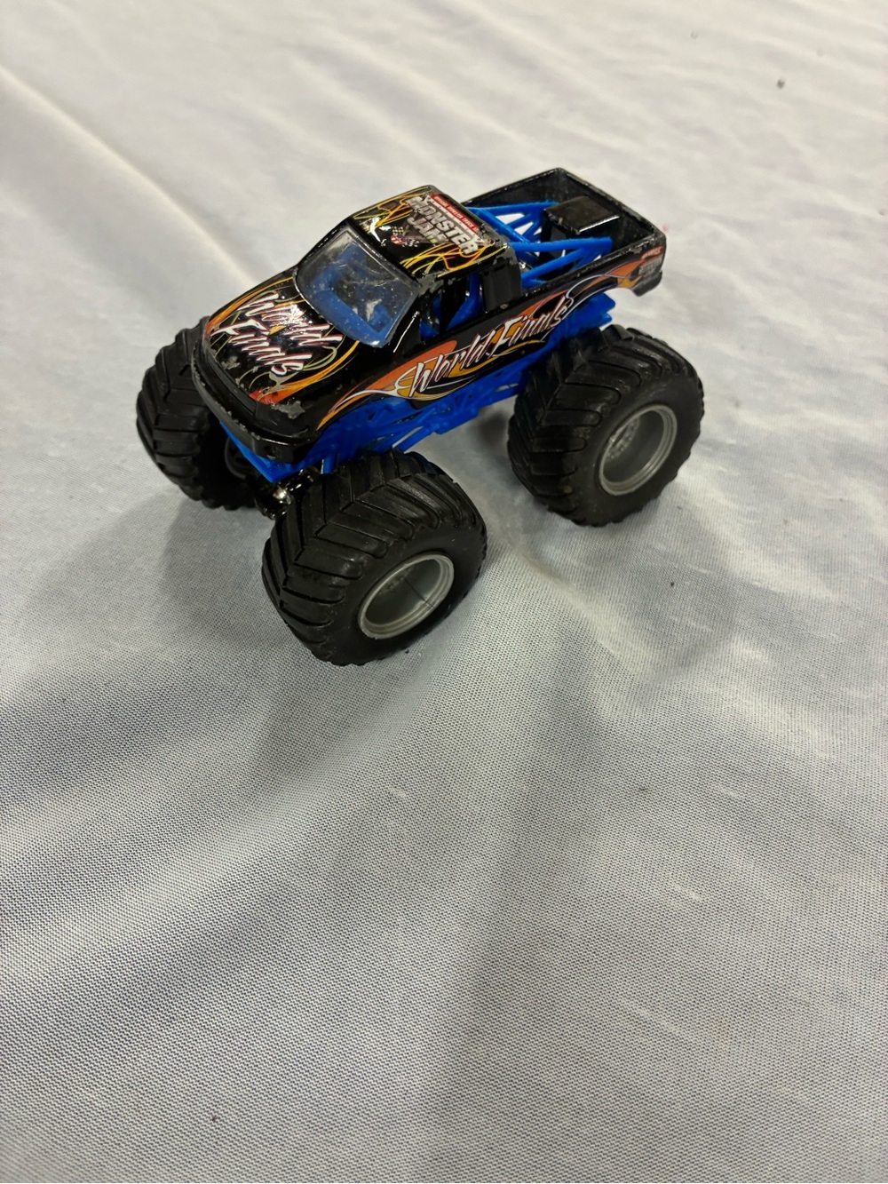 Hot Wheels Monster Jam WORLD FINALS Black Pickup Truck 1:64 Scale Damaged